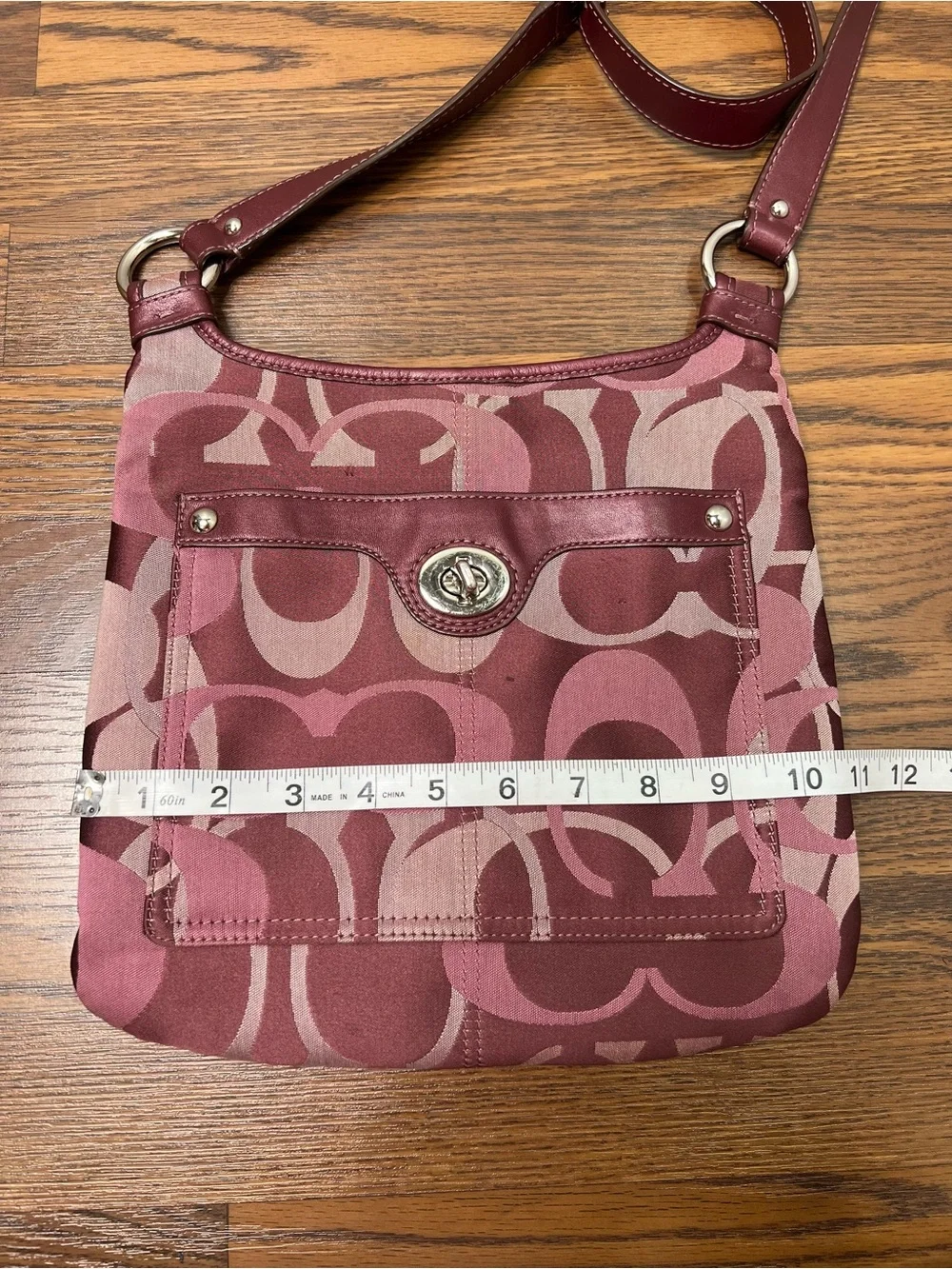 Coach Penelope Optic Signature Hippie Crossbody Bag in a purple/plum color